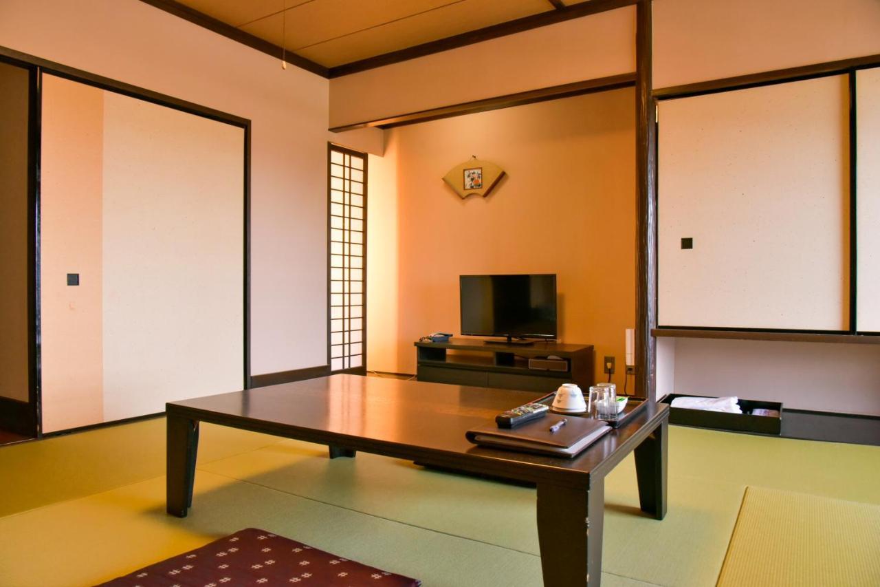 Aso Hotel Esterno foto