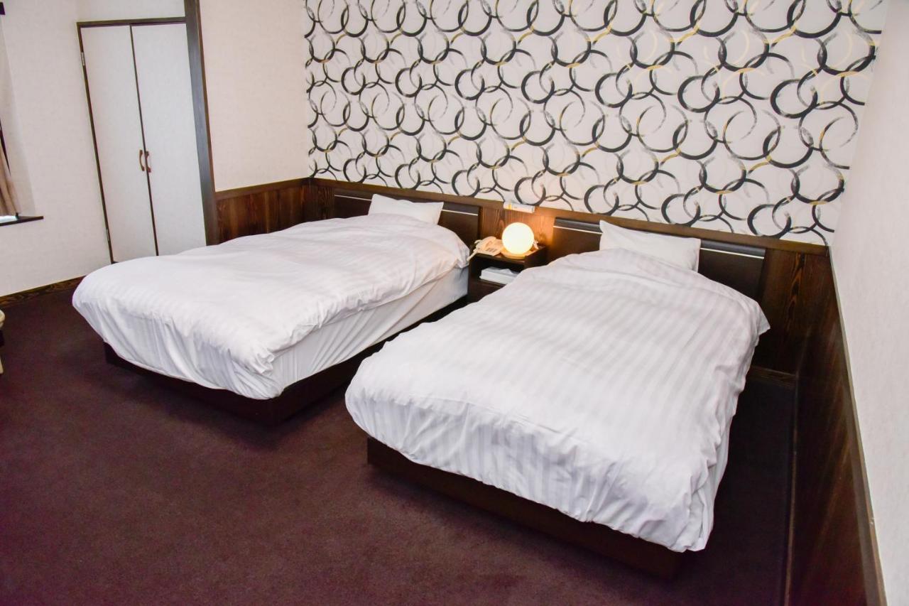 Aso Hotel Esterno foto