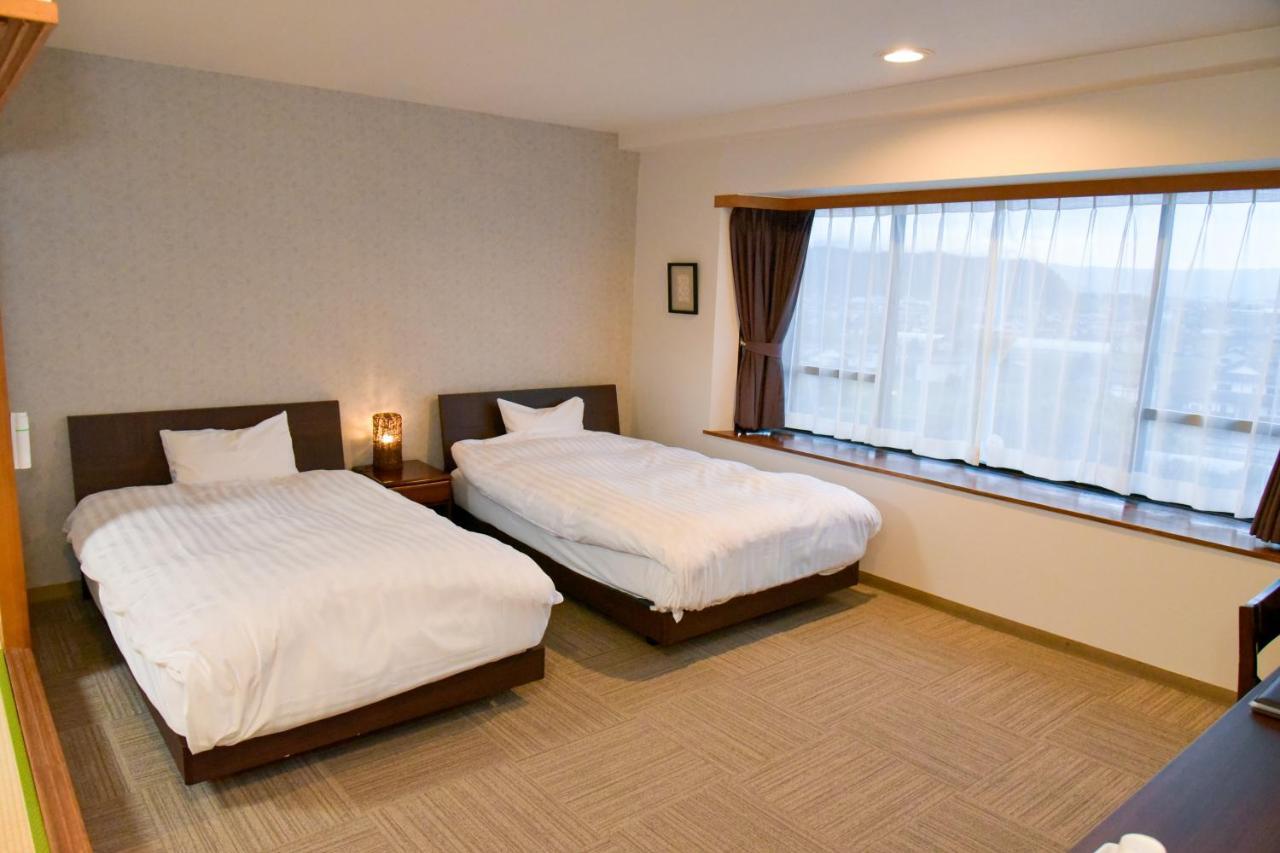 Aso Hotel Esterno foto