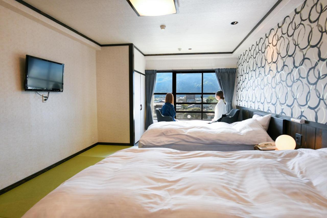 Aso Hotel Esterno foto
