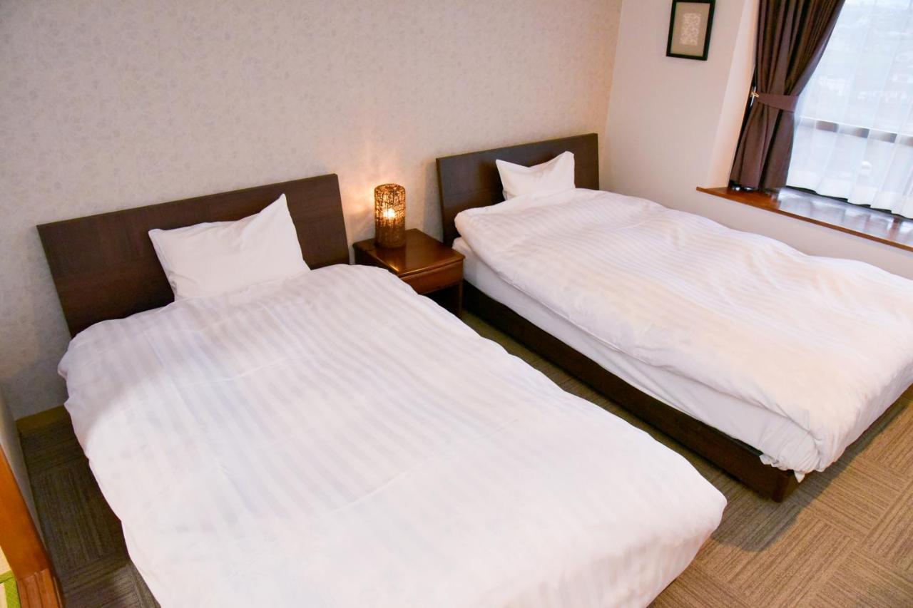 Aso Hotel Esterno foto