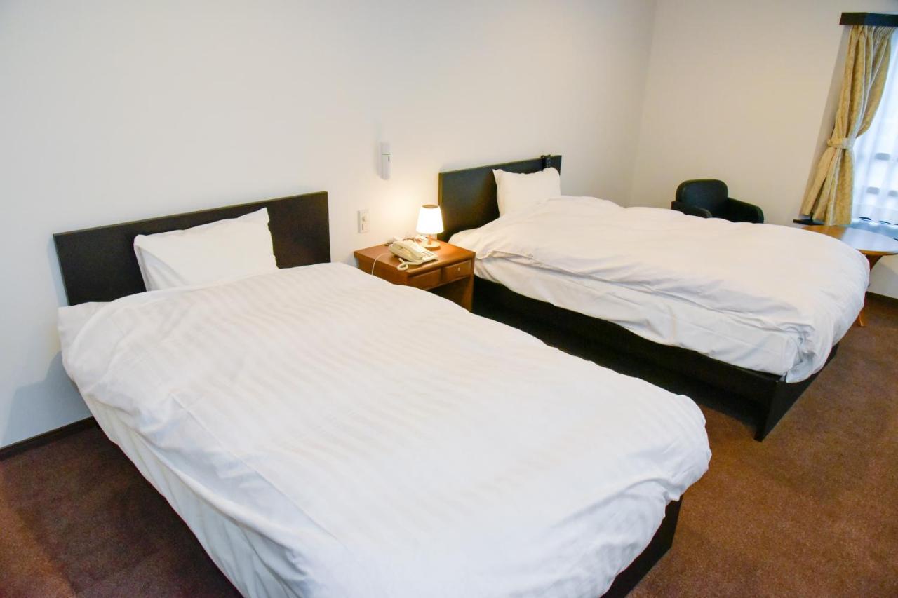 Aso Hotel Esterno foto