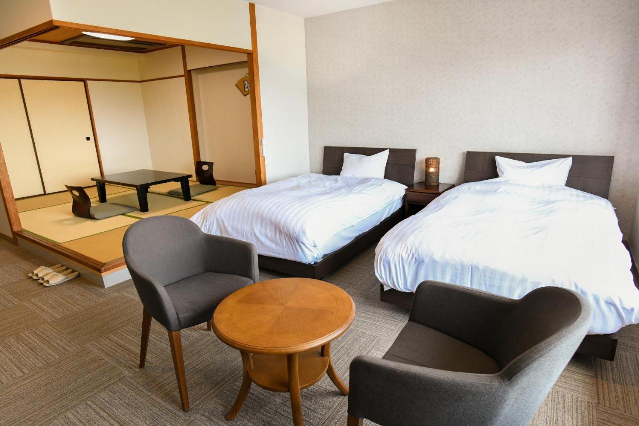 Aso Hotel Esterno foto