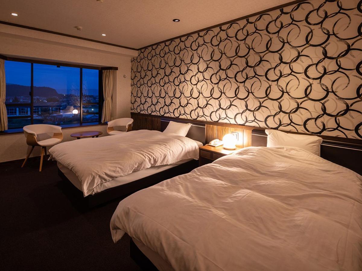 Aso Hotel Esterno foto